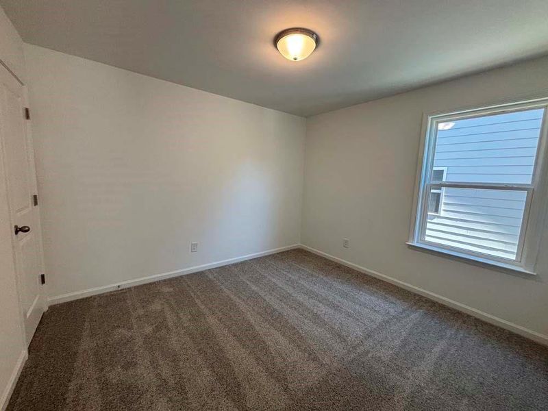 Spacious, unfurnished interior of a new home in Creekside, Dawsonville (Image 22).