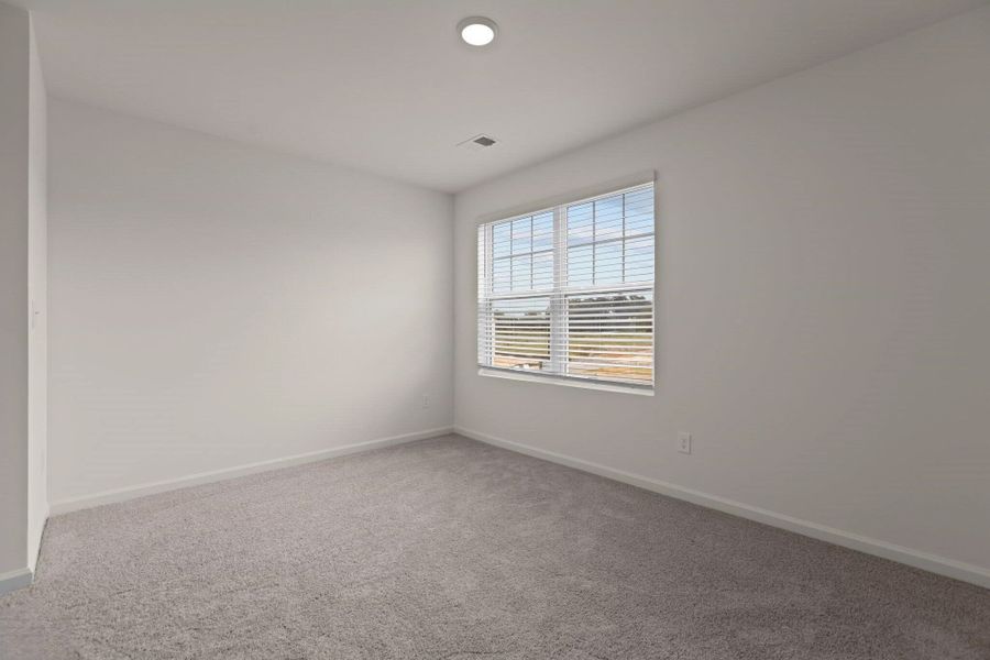 Representative unfurnished interior of a home built from the Hubble by Starlight Homes in Bayview, Conway (Image 21).