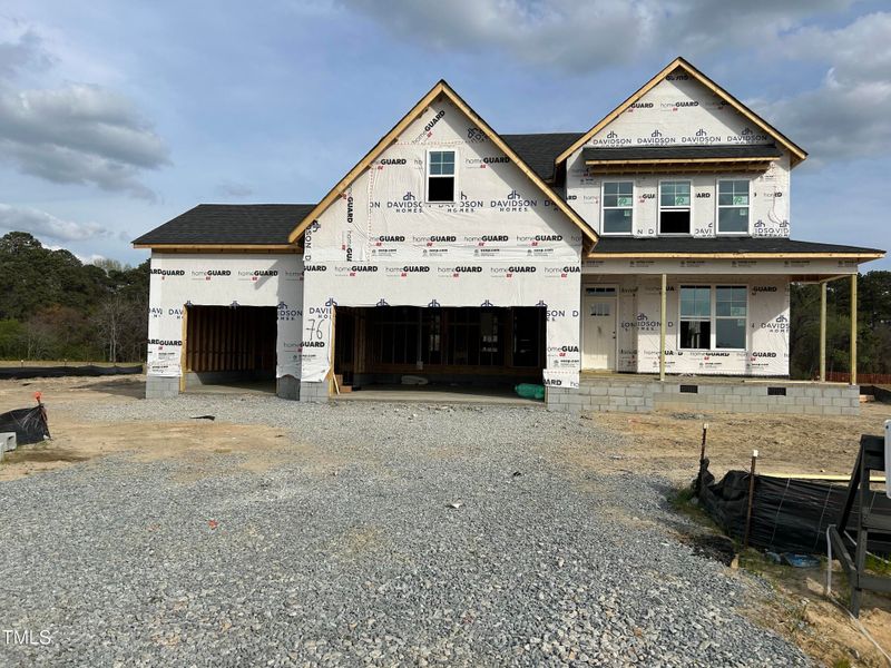 Front exterior of a new home in Tobacco Road, Angier, NC, highlighting curb appeal (Image 57). Front exterior of a new home in Tobacco Road, Angier, NC, highlighting curb appeal (Image 57).