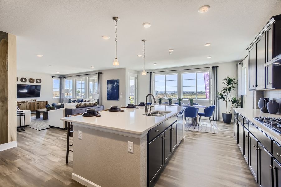A kitchen with a large island. A kitchen with a large island.
