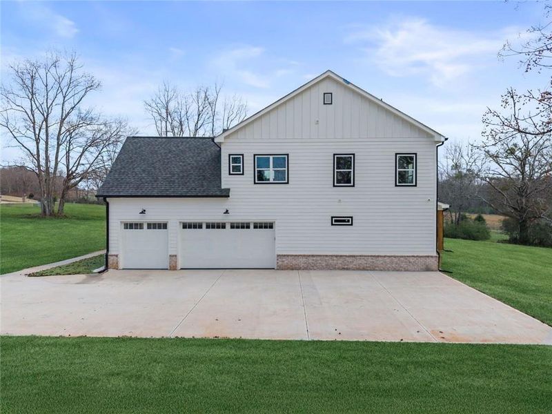 Front exterior of a new home in , Social Circle, GA, highlighting curb appeal (Image 28).