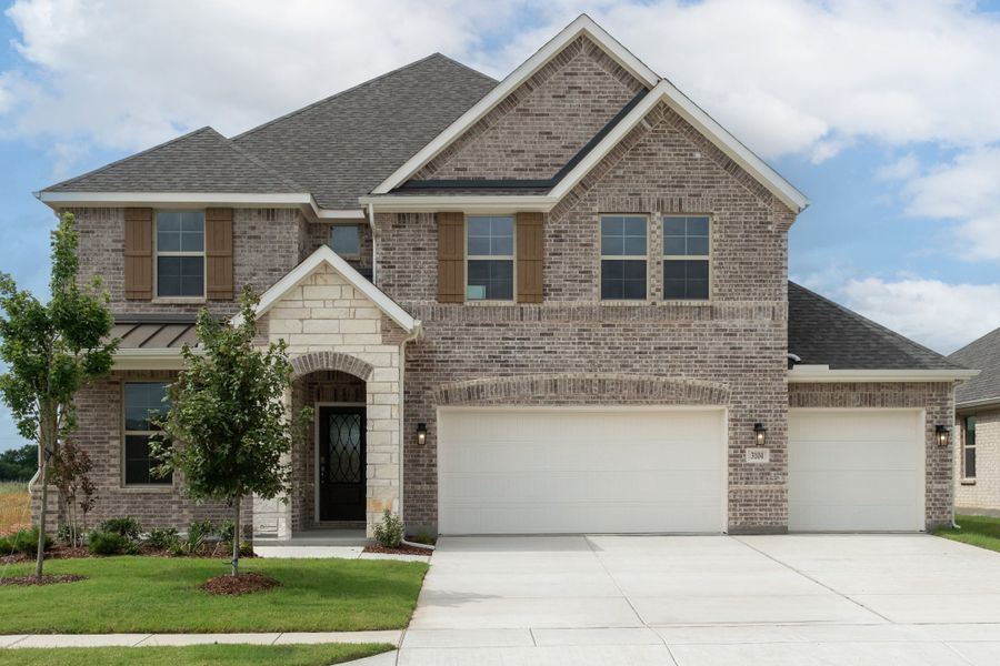 Front exterior of a new home in Verandah, Royse City, TX, highlighting curb appeal (Image 1). Front exterior of a new home in Verandah, Royse City, TX, highlighting curb appeal (Image 1).