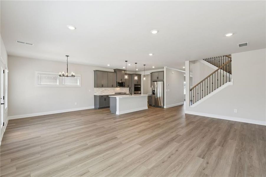 Spacious, unfurnished interior of a new home in Vines at Mill Creek - Estate Series, Braselton (Image 23).