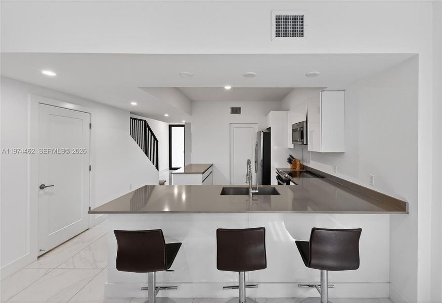 Furnished interior view inside a new home in , Dania Beach (Image 15).