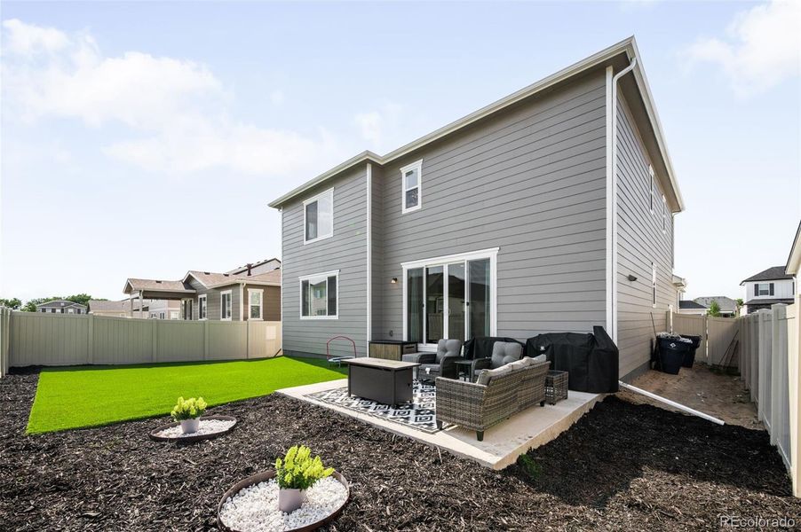 Exterior details and patio area of a home in Thompson River Ranch, Johnstown (Image 22).