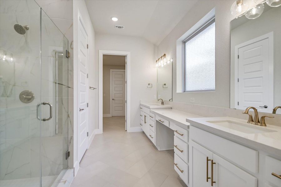 Clean lines and a long double vanity define this modern main bathroom. Clean lines and a long double vanity define this modern main bathroom.