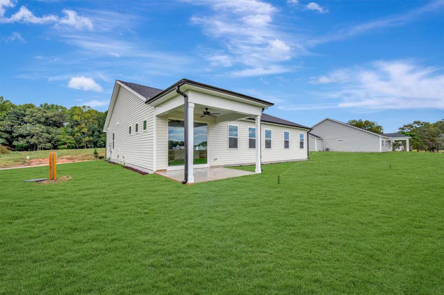 Exterior details and patio area of a home in McAlister Creek, Clayton (Image 4).