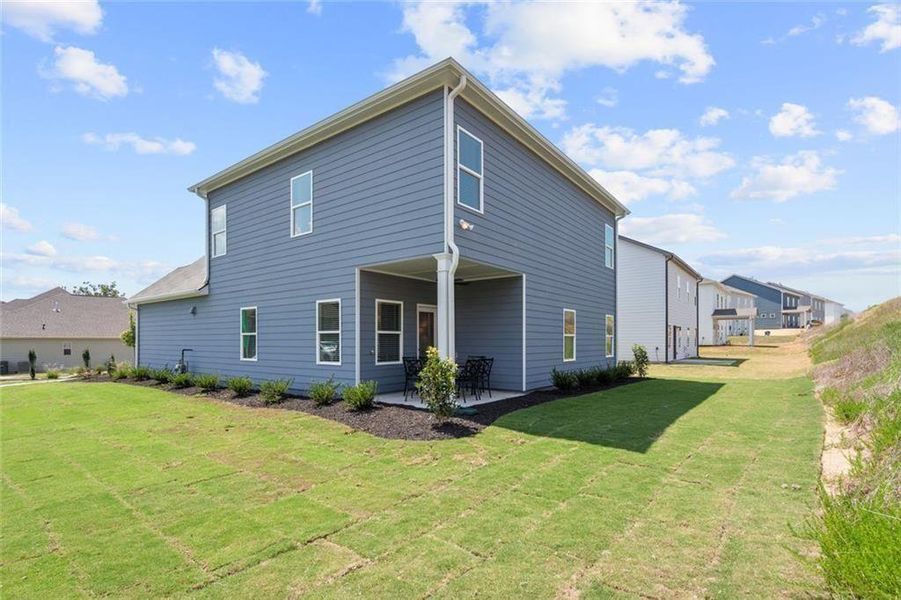 Exterior details and patio area of a home in Sycamore Crest, Calhoun (Image 3).