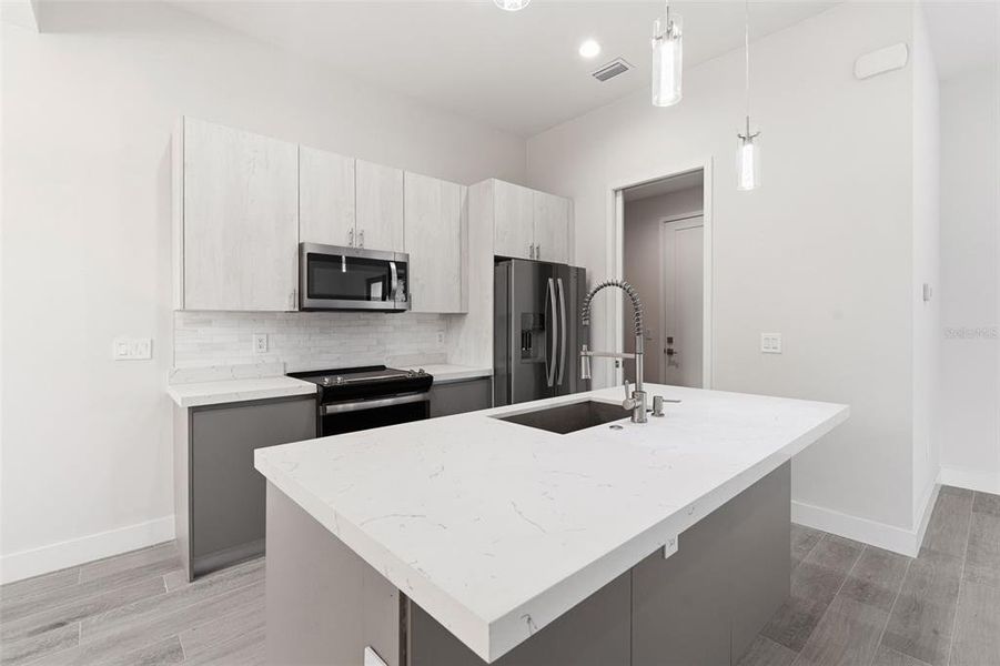 Furnished interior view inside a new home in , Port Charlotte (Image 11). Furnished interior view inside a new home in , Port Charlotte (Image 11).