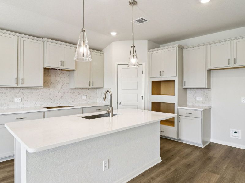 Furnished interior view inside a new home in Estancia Ranch - Classic Series, San Antonio (Image 4).
