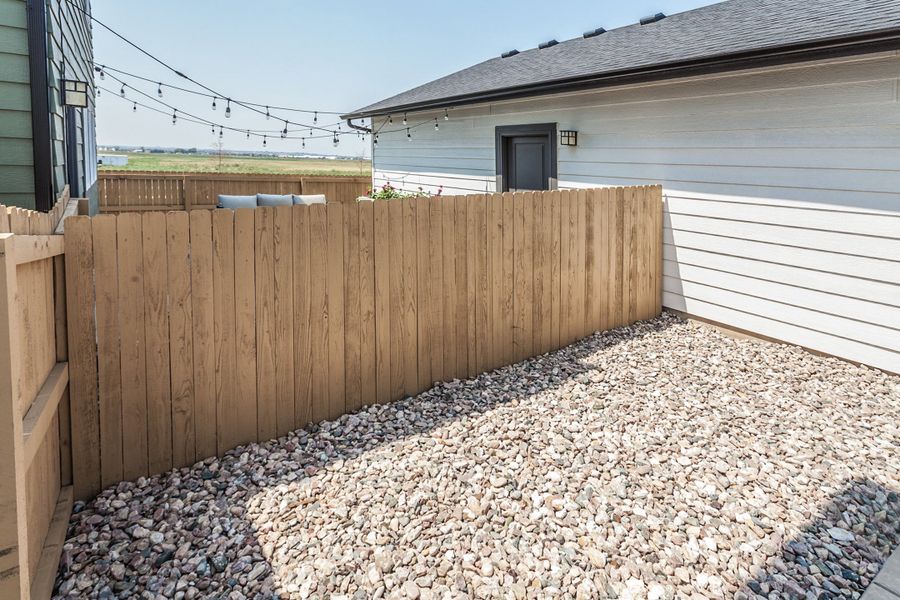 Exterior details and patio area of a home in Prairie Song, Windsor (Image 31). Exterior details and patio area of a home in Prairie Song, Windsor (Image 31).