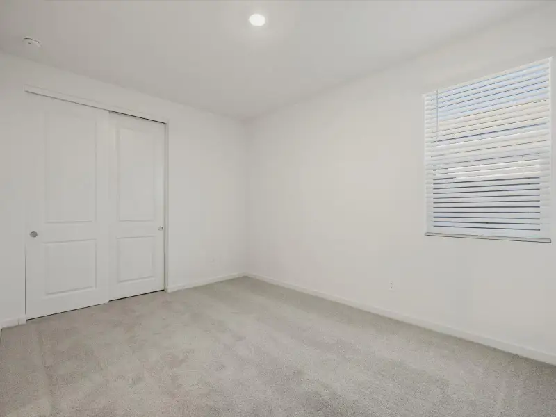 Spacious, unfurnished interior of a new home in Entrada Reserve Series, Tolleson (Image 12).