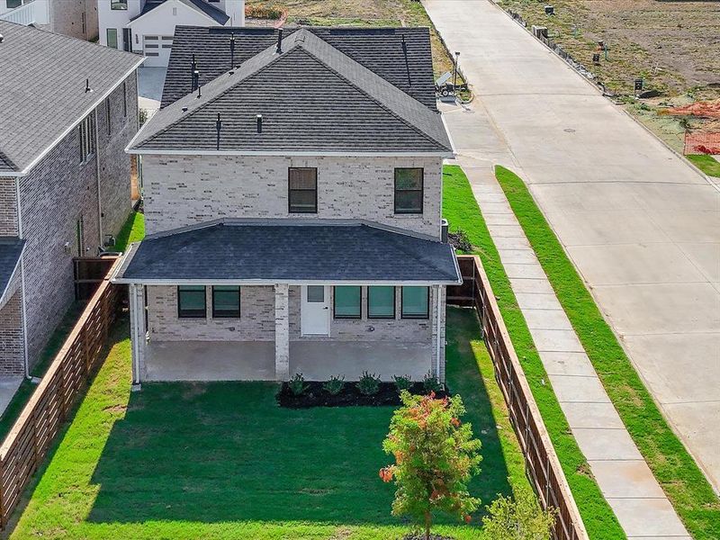Front exterior of a new home in Royal Court, Little Elm, TX, highlighting curb appeal (Image 18). Front exterior of a new home in Royal Court, Little Elm, TX, highlighting curb appeal (Image 18).