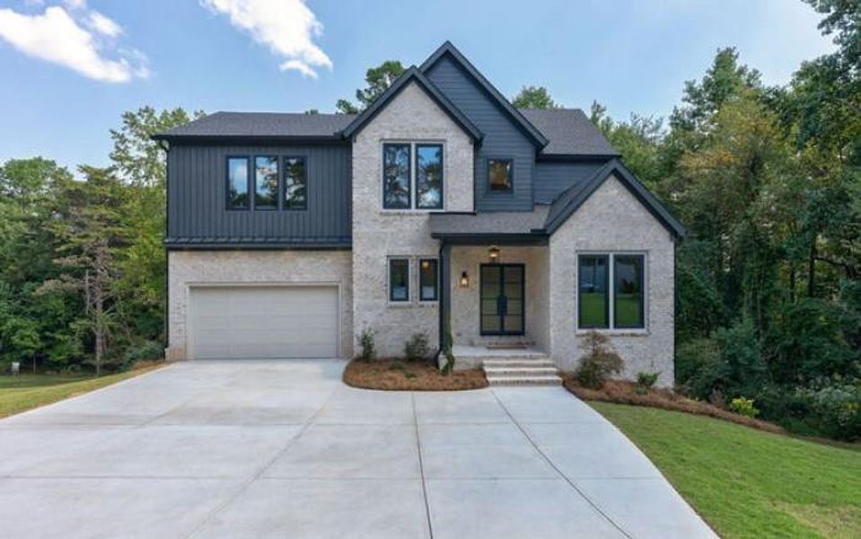 Front exterior of a new home in , Cumming, GA, highlighting curb appeal (Image 25). Front exterior of a new home in , Cumming, GA, highlighting curb appeal (Image 25).
