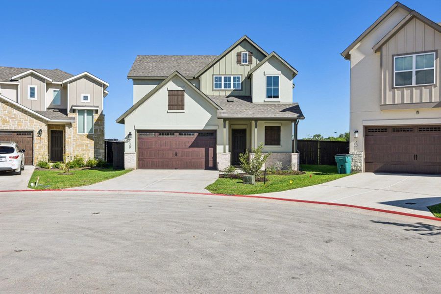 Front exterior of a new home in Cross Creek, Cedar Park, TX, highlighting curb appeal (Image 21).