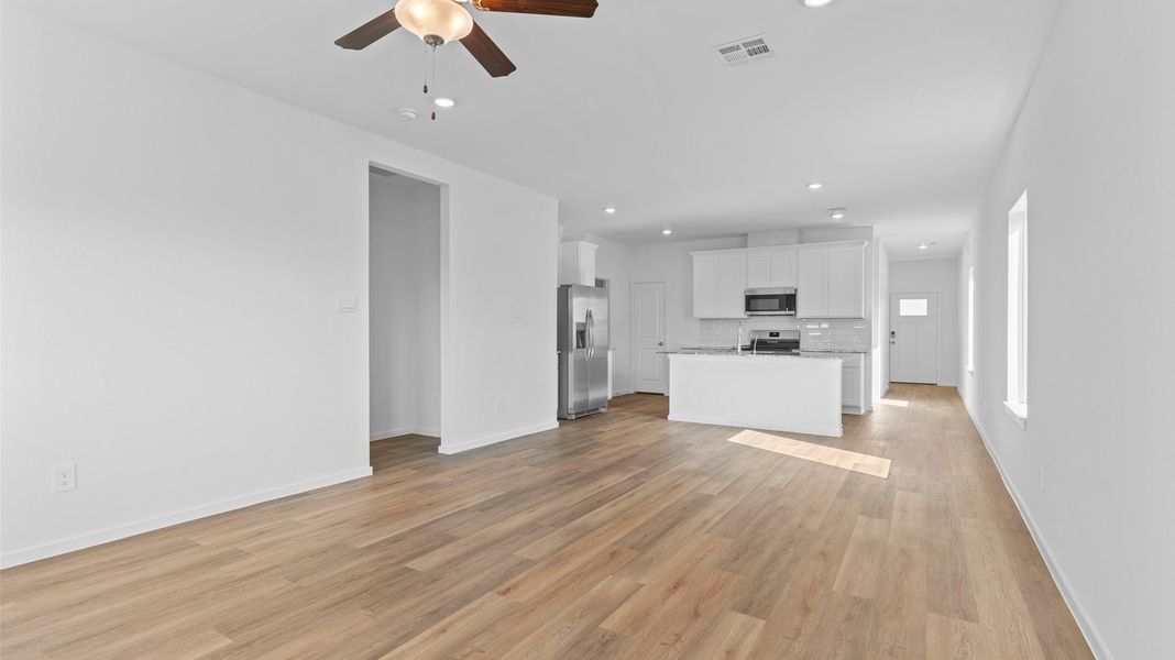 Representative unfurnished interior of a home built from the Florence by D.R. Horton in Riverwood Ranch, Angleton (Image 12). Representative unfurnished interior of a home built from the Florence by D.R. Horton in Riverwood Ranch, Angleton (Image 12).