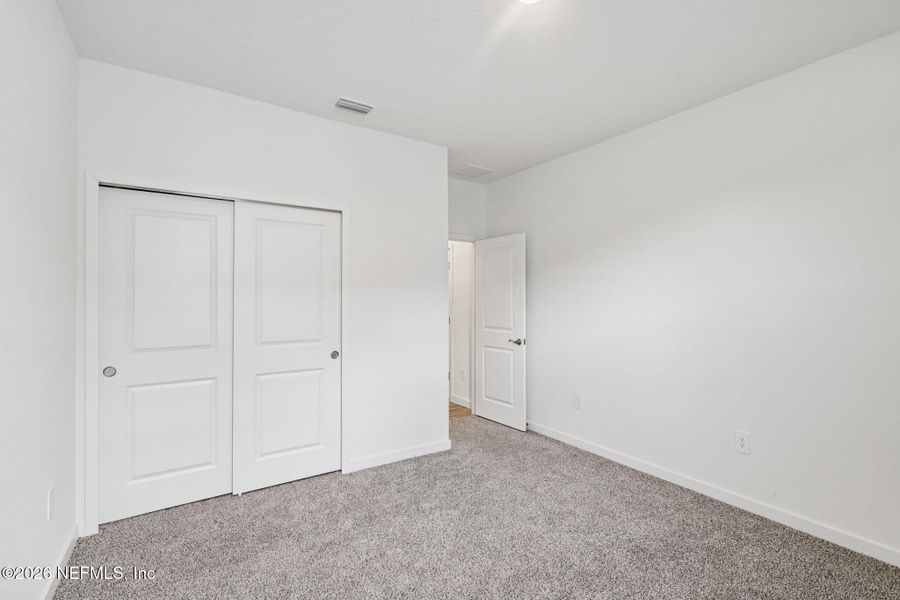 Spacious, unfurnished interior of a new home in Flagler Village - Signature Series, Palm Coast (Image 23). Spacious, unfurnished interior of a new home in Flagler Village - Signature Series, Palm Coast (Image 23).