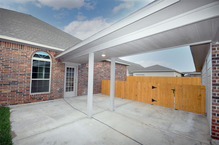 Breezeway from garage to the home. Breezeway from garage to the home.