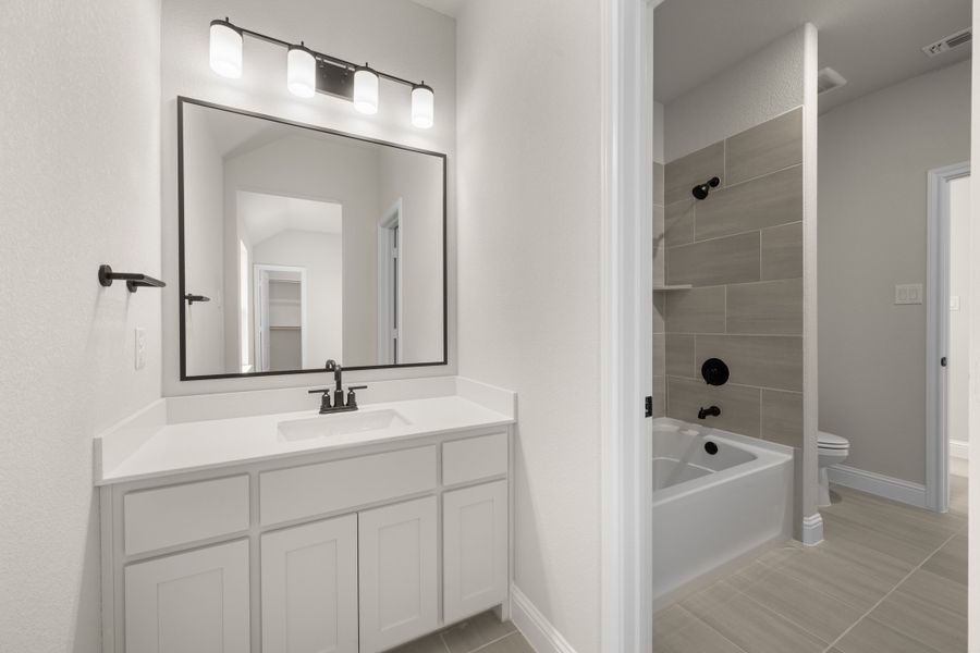Furnished interior view inside a new home in Coyote Crossing, Godley (Image 11).