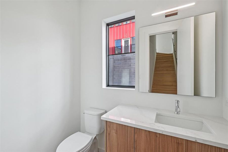 half bath situated opposite the kitchen half bath situated opposite the kitchen