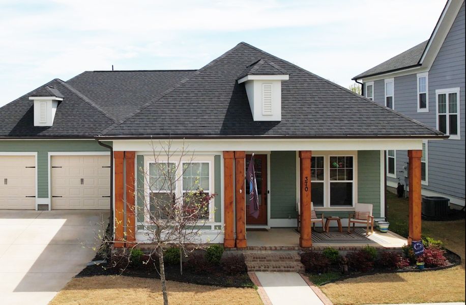 Representative exterior photo of a completed home built from the The Riposo by Avencia Homes in Riverwalk, Rock Hill, SC (Image 1).