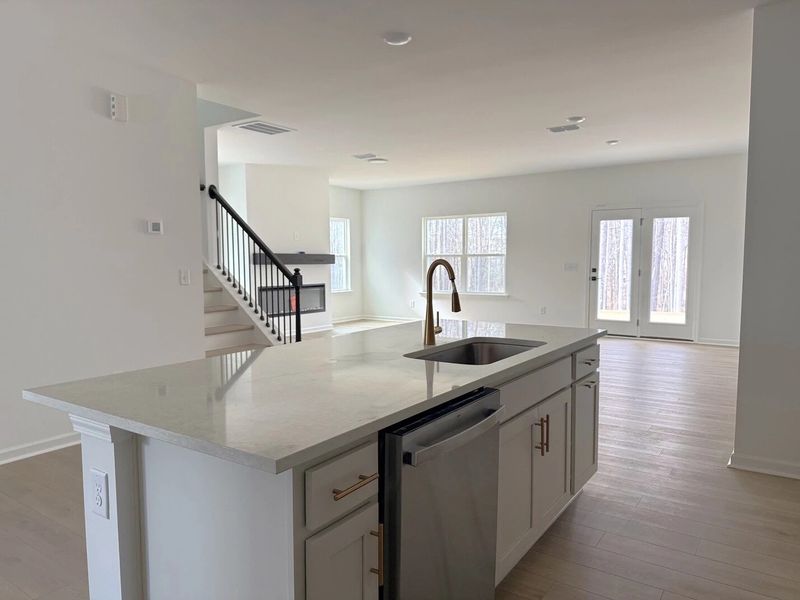 Kitchen featuring the AW Collection® Serene - Clean lines and earthy textures define the space. Kitchen featuring the AW Collection® Serene - Clean lines and earthy textures define the space.