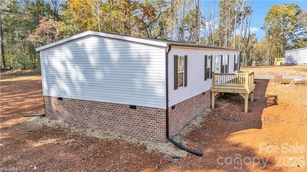 Exterior details and patio area of a home in , Taylorsville (Image 12).