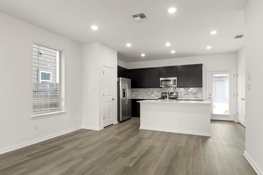 Furnished interior view inside a new home in Blanco Vista, San Marcos (Image 8).