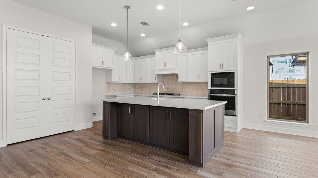 Furnished interior view inside a new home in Elyson, Katy (Image 7).