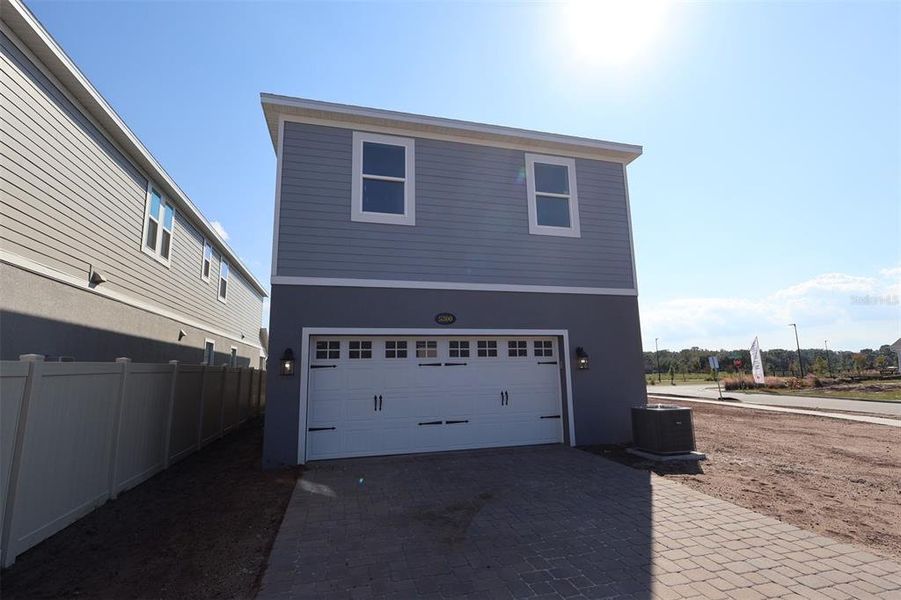 Exterior details and patio area of a home in Center Lake on the Park, St. Cloud (Image 2).