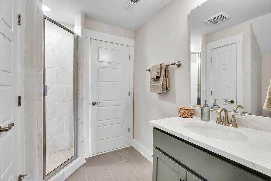 Furnished interior view inside a new home in The Bluffs On the Cape Fear, Leland (Image 41).