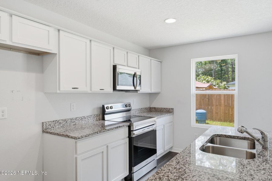 Furnished interior view inside a new home in , Jacksonville (Image 15).