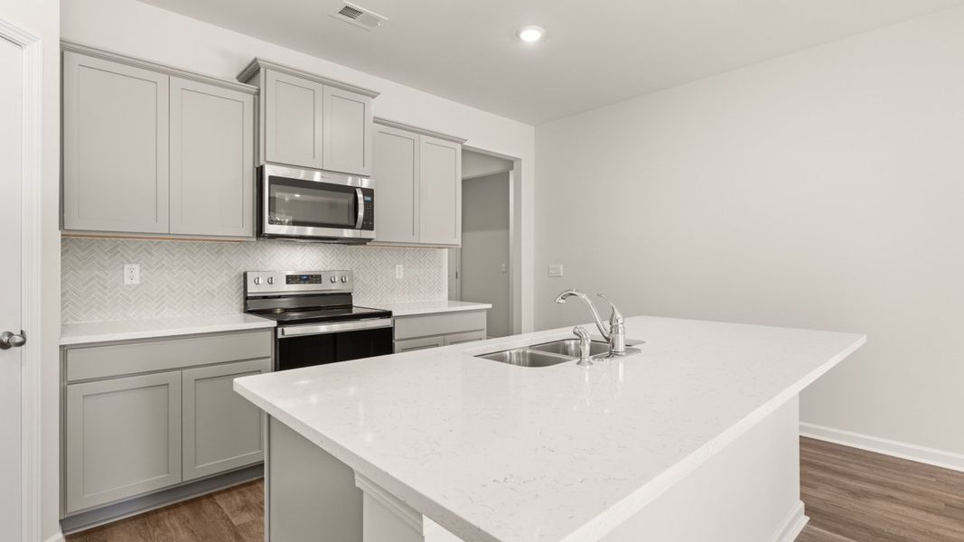 Furnished interior view inside a new home in Champion's Run, Lithonia (Image 5).