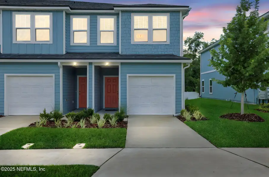 Front exterior of a new home in , Jacksonville, FL, highlighting curb appeal (Image 21).