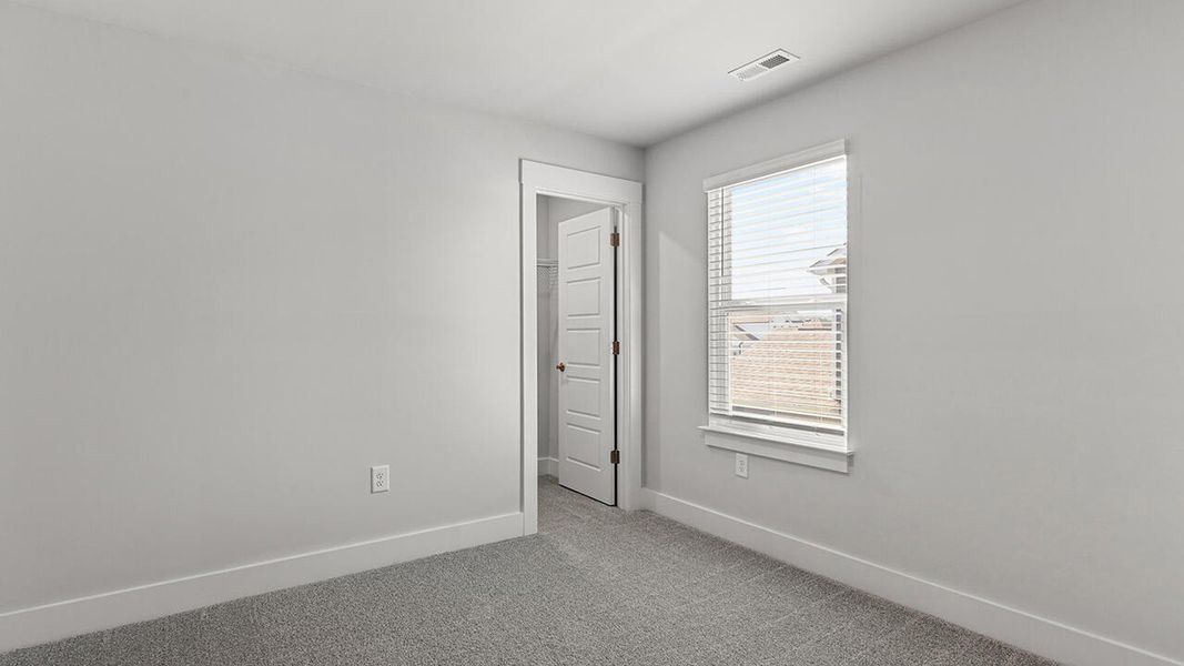 Spacious, unfurnished interior of a new home in Cedar Hill Landing, Navassa (Image 28).