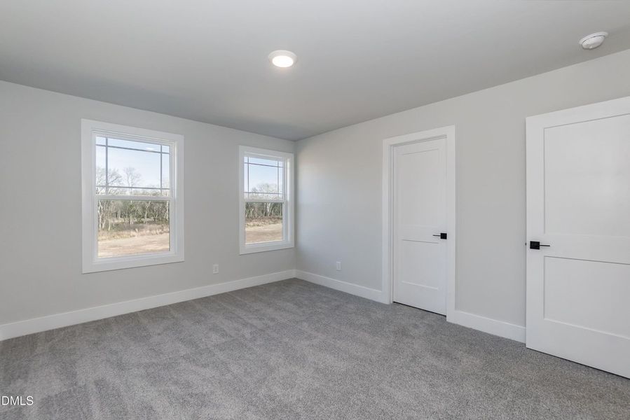 Spacious, unfurnished interior of a new home in Charlotte's Ridge, Middlesex (Image 30).