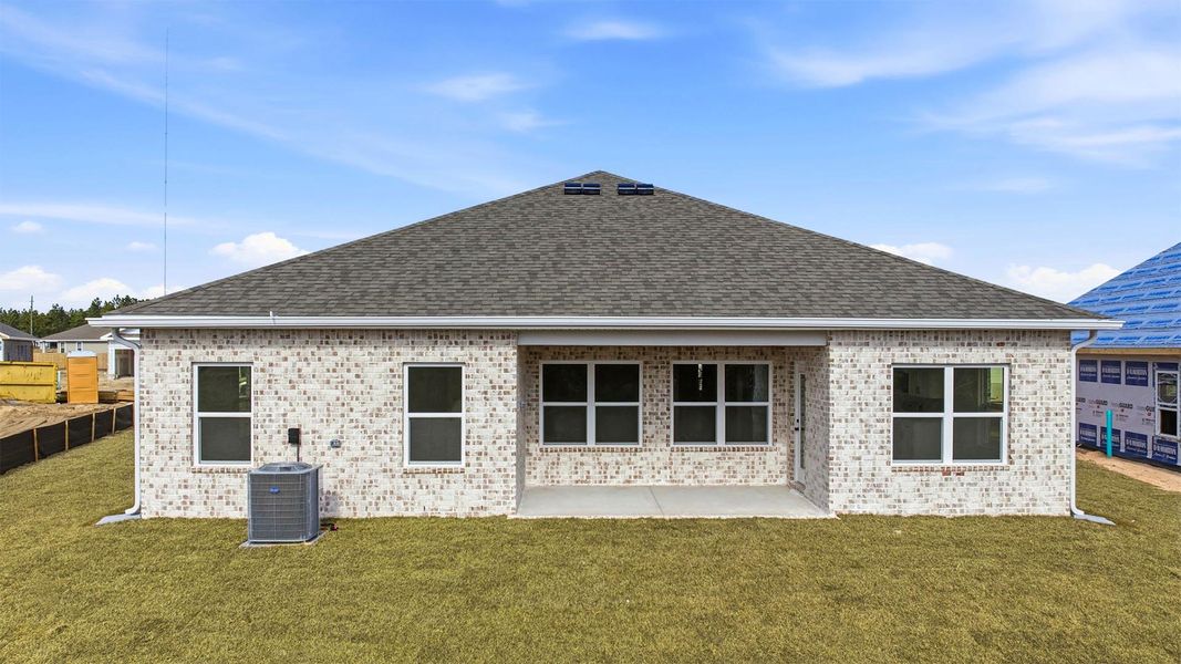 Exterior details and patio area of a home in Owl's Head Farms, Freeport (Image 3).