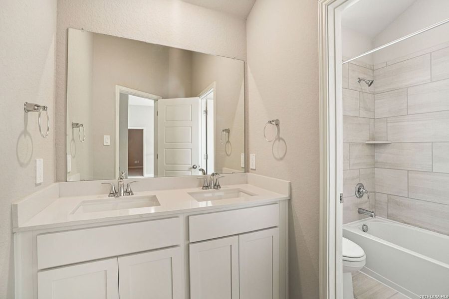 Furnished interior view inside a new home in Estancia Ranch - Classic Series, San Antonio (Image 12).