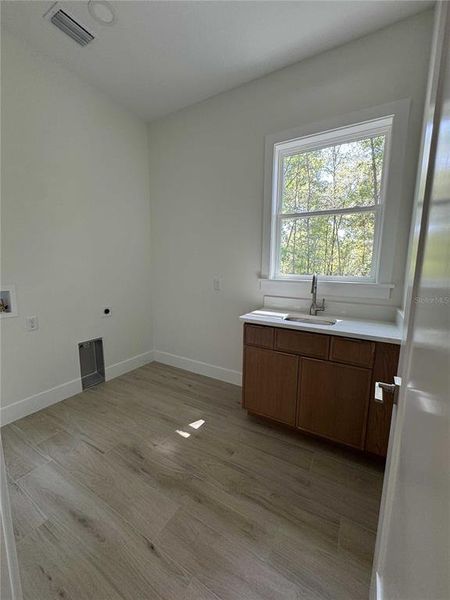 Furnished interior view inside a new home in , Dunnellon (Image 9).