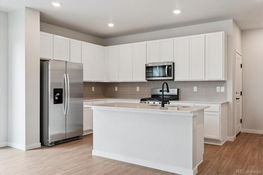 Furnished interior view inside a new home in Paired Homes at Alder Creek, Parker (Image 6). Furnished interior view inside a new home in Paired Homes at Alder Creek, Parker (Image 6).