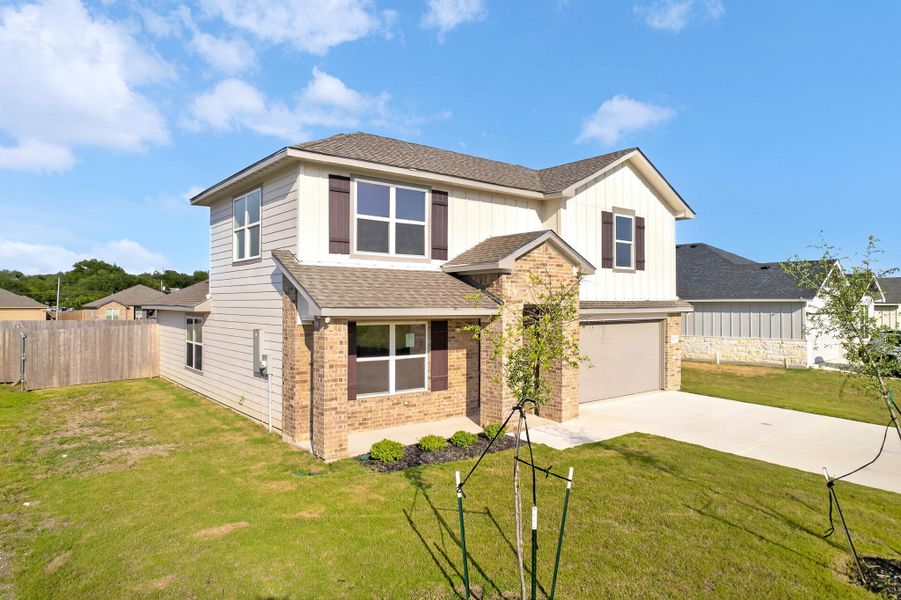 Front exterior of a new home in , Temple, TX, highlighting curb appeal (Image 18).