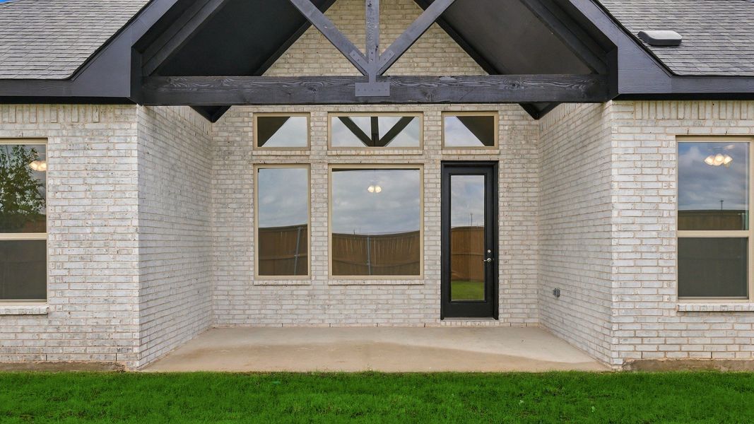 Exterior details and patio area of a home in Green Meadows Classic, Celina (Image 26).