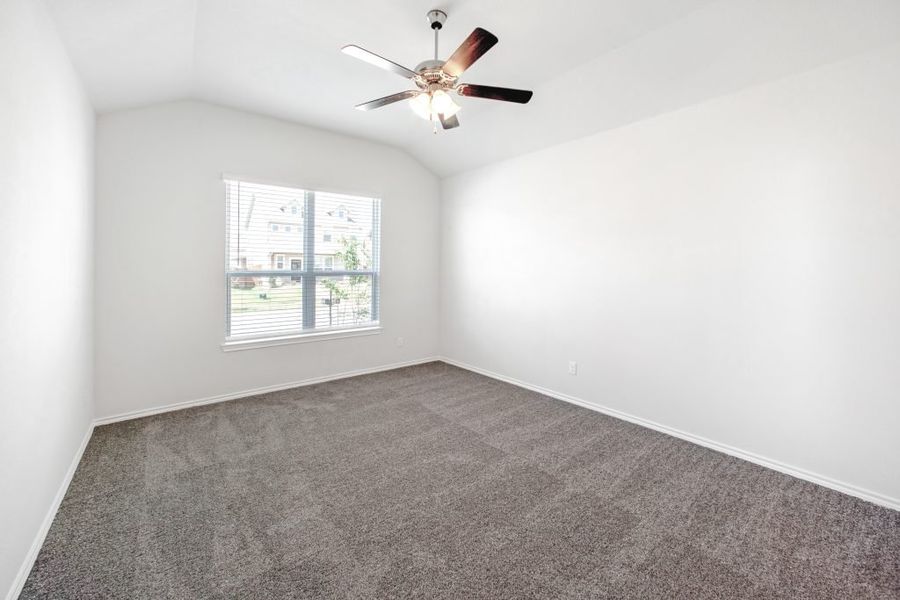 Representative exterior photo of a completed home built from the Bastrop by Impression Homes in Heartland, Heartland, TX (Image 18).
