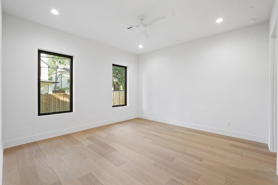 SEE the attached Plan layout: The 16x14 downstairs guest bedroom has good northern light. The wood floor runs through both floors of the house. There is exceptionally large closet storage space for this room.