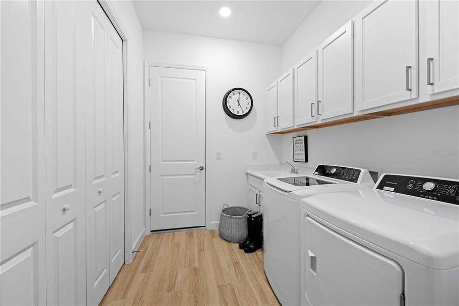 Furnished interior view inside a new home in Harbor East: Estate Homes, Port Charlotte (Image 2). Furnished interior view inside a new home in Harbor East: Estate Homes, Port Charlotte (Image 2).