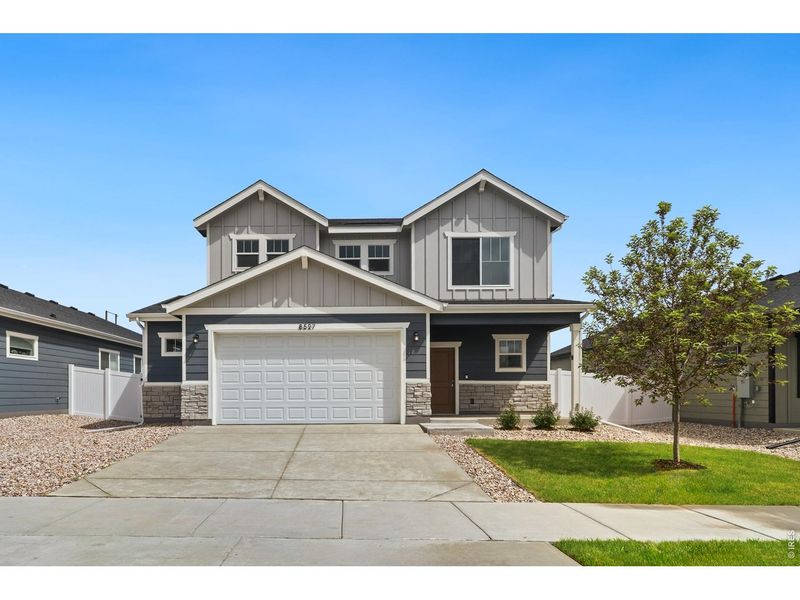 Front exterior of a new home in Union Colony West, Greeley, CO, highlighting curb appeal (Image 1). Front exterior of a new home in Union Colony West, Greeley, CO, highlighting curb appeal (Image 1).