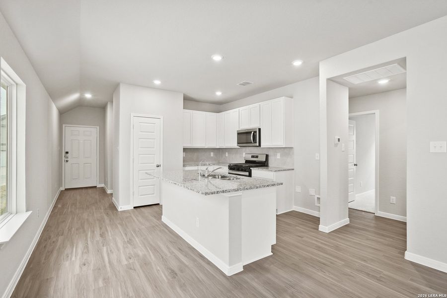 Furnished interior view inside a new home in Hickory Ridge, Elmendorf (Image 14).
