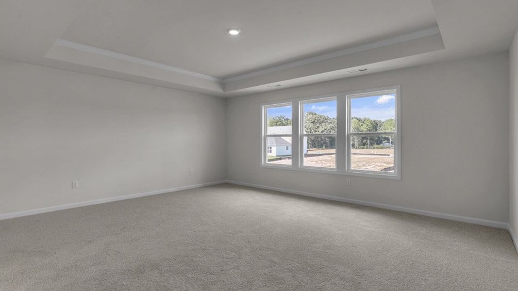 Representative unfurnished interior of a home built from the NORMAN by D.R. Horton in Eagle Creek, Fuquay Varina (Image 20).