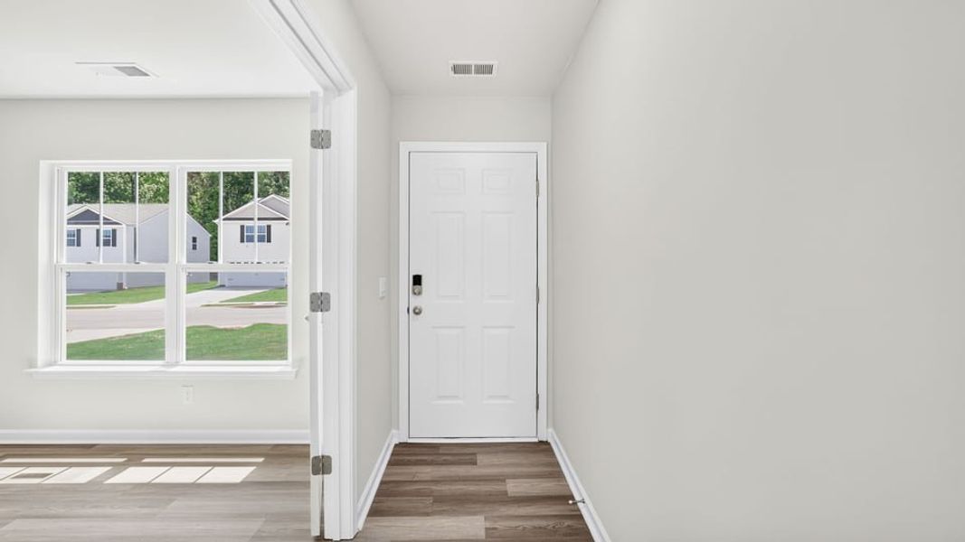 Spacious, unfurnished interior of a new home in Bentley Park, Greenwood (Image 17).