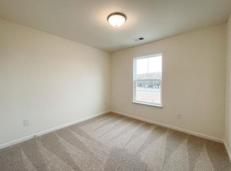 Spacious, unfurnished interior of a new home in Bellevue Townhomes, Greenville (Image 20).